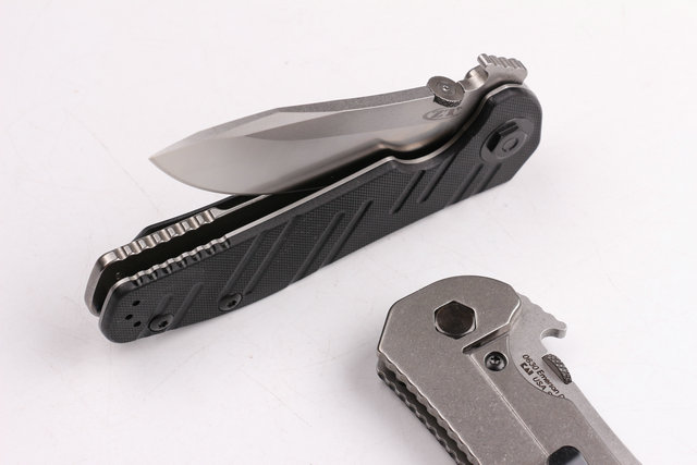 ZT0630 Zero Tolerance Titanium handle folding knife with G10 UD403393